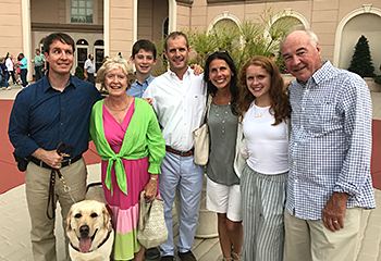 Guide dog Hogan with Pat and his family after seeing a show at the Sight and Sound Theatre in Lancaster, Pennsylvania.